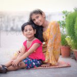 sibling photography, home terrace garden, Meerut, 4 years girl, 12 years girl, smiling, posing, anubhavshaphotography