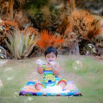 1 year pre birthday cake smash photography, garden, props, flowers, bubbles, anubhavshaphotography, colorful strip dress
