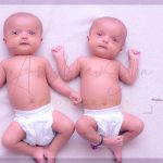 1 year twins baby photography, indoor, home, props, pink background, happy, playing, enjoying, anubhavshaphotography