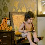 1 year traditional baby photoshoot indoor home, gallice shorts, smiling, anubhavshaphotography