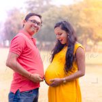 maternity pregnancy photography, outdoor, pregnant wife posing with husband, laughing love, care, anubhavshaphotography
