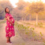 maternity pregnancy photography, outdoor, pregnant woman posing in sunset, red floral dress, love, posing, care, anubhavshaphotography