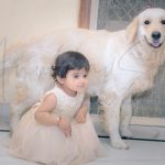 sibling photoshoot indoor home, Delhi, 1 year girl posing with labrador retriever, pet, dog, smiling, anubhavshaphotography