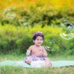 1 year pre birthday cake smash photography, garden, props, flowers, bubbles, anubhavshaphotography, check skirt, tiara