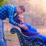 maternity pregnancy photography, outdoor, husband kissing on pregnant wife forehead, love, posing, care, anubhavshaphotography