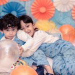 sibling photoshoot indoor home, delhi, 1 year boy, 6 years girl, playing, laughing, cake smash backdrop, anubhavshaphotography