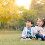 sibling photoshoot outdoor garden, indrapuram, 1 year boy, 2 years girl, sitting, posing, laughing anubhavshaphotography