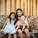 sibling photoshoot indoor, indrapuram, three babies sitting on sofa, posing, anubhavshaphotography