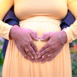 pregnancy maternity photoshoot, outdoor, husband, pregnant wife, hands in heart shape, love, posing, care, anubhavshaphotography