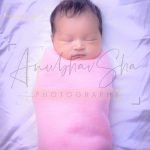 newborn infant photography, indoor home, props, anubhavshaphotography, sleeping baby in pink wrapper