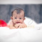 newborn infant photography, indoor home, props, anubhavshaphotography, baby raising head and looking