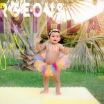 1 year poser baby photography, garden, props, girl in colorful frill skirt, flowers band, dancing, anubhavshaphotography