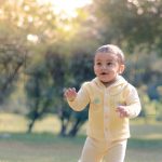 1 year poser baby photography, garden, props, boy in yellow woollen dress, posing, anubhavshaphotography