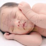 newborn infant photography, indoor home, props, anubhavshaphotography, face closeup with hands