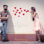 pre wedding photography, man wearing brown t-shirt with denim, girl in peach dress, fly kiss, posing, anubhavshaphotography