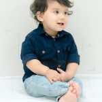 1 year sitting baby photoshoot indoor home formal blue denim shirt jeans silky hairs