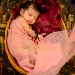 newborn infant photography, indoor home, props, anubhavshaphotography, pink wrapper, sleeping girl in basket