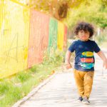 2 years poser baby toddler photography, home, props, boy in blue t-shirt, khaki pants, walking, anubhavshaphotography