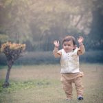 1 year traditional baby photoshoot outdoor garden, nehru jacket, beige kurta payjama, anubhavshaphotography