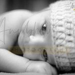 newborn baby photoshoot indoor home, Delhi, wearing wollen cap, closeup eyes and face, anubhavshaphotography
