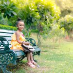 5 years poser baby photography, garden, props, girl yellow dress, sitting on bench, holding ladies bag, anubhavshaphotography