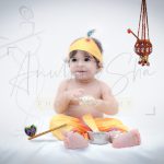 1 year traditional baby photoshoot indoor home, colorful krishna janmashtami theme props, anubhavshaphotography