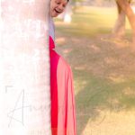 maternity pregnancy photography, outdoor, husband looking at pregnant wife's belly, love, posing, care, anubhavshaphotography