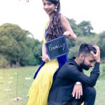 pre wedding photography, boy girl posing wedding date with slate chalk, anubhavshaphotography