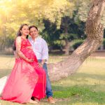 maternity pregnancy photography, outdoor, pregnant wife sitting on husband lap, love, posing, care, anubhavshaphotography