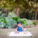 1 year pre birthday cake smash photography, garden, props, flowers, bubbles, anubhavshaphotography, blue denim dress