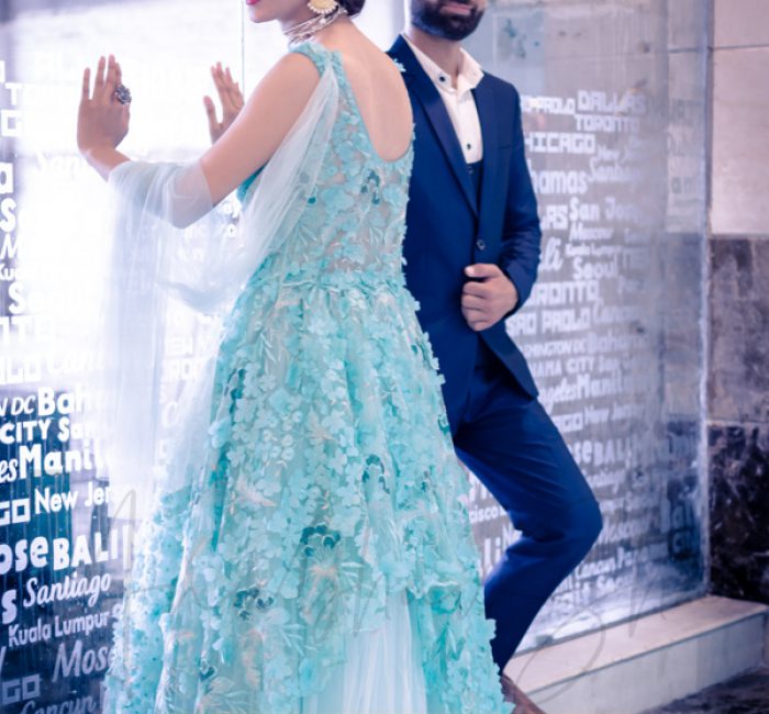 fashion photography nearby, ambience mall, Gurugram, man wearing blue formal suit, girl in cyan long dress, posing, anubhavshaphotography