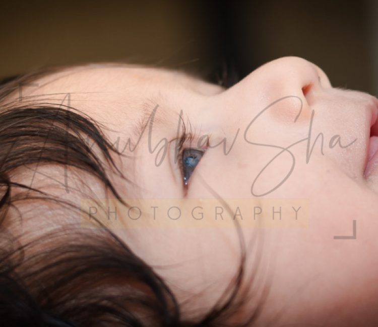 newborn infant photography, indoor home, props, anubhavshaphotography, smiling face closeup