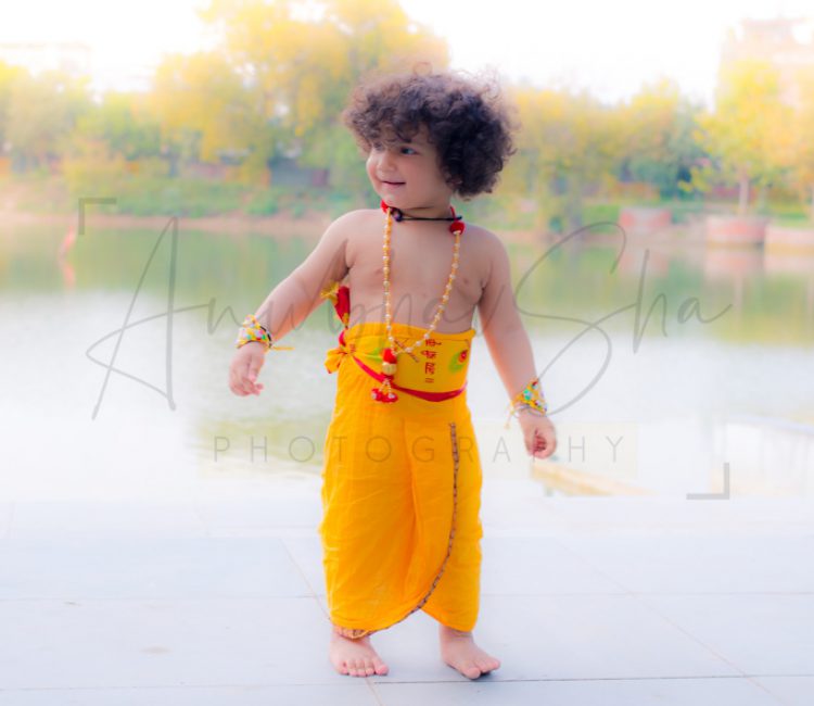 1 year traditional baby photoshoot outdoor, colorful krishna janmashtami theme props, anubhavshaphotography