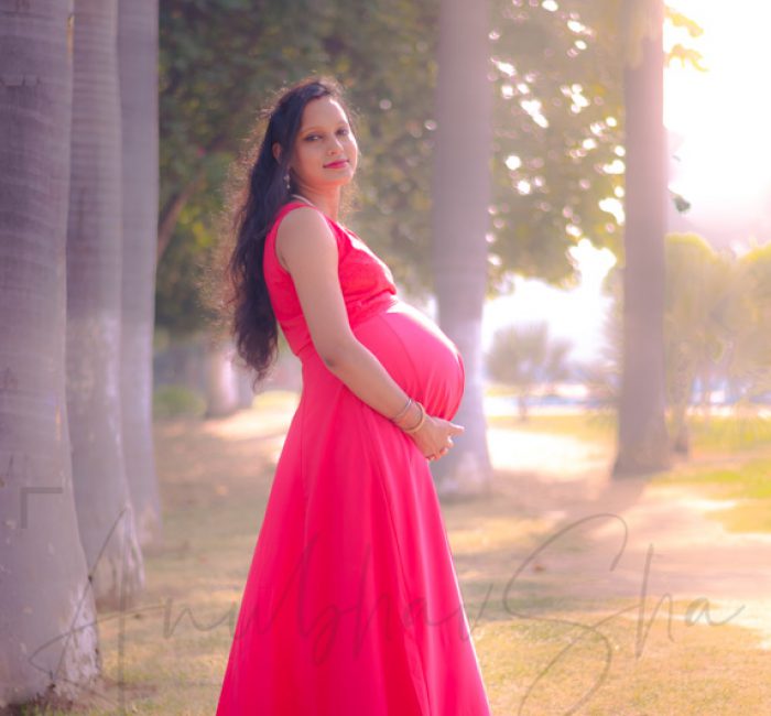 maternity pregnancy photography, outdoor, pregnant woman posing in sunset, red gown, love, care, anubhavshaphotography