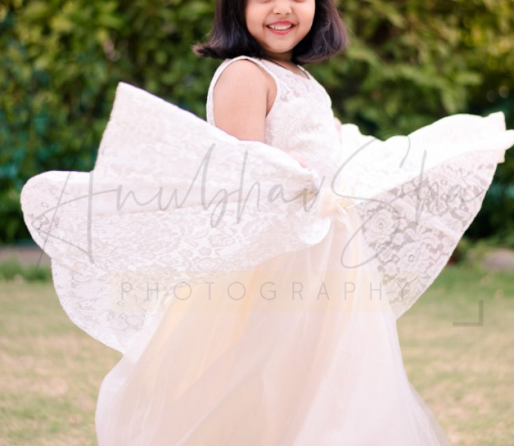 6 years traditional baby photoshoot outdoor, garden, frill long dress, dancing girl, anubhavshaphotography